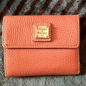 Dooney & Bourke Pebbled Leather Small Wallet in Caramel is gently used.